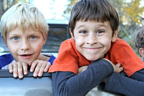 two boys making funny faces