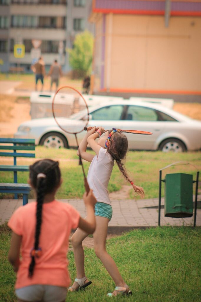 Kids playing badminton