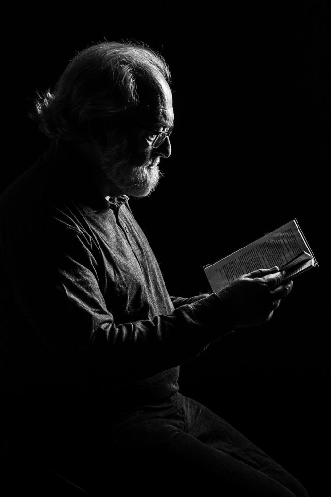 Man reading a book for men