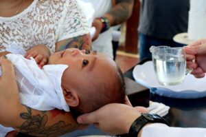 infant being baptized