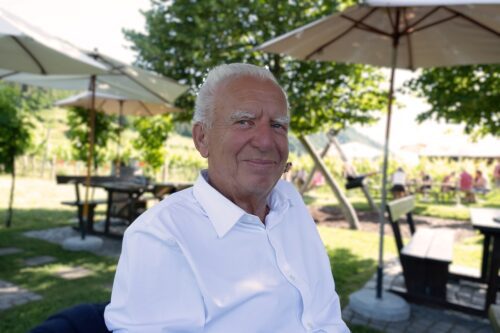 Happy Old man celebrating his 75 years birthday