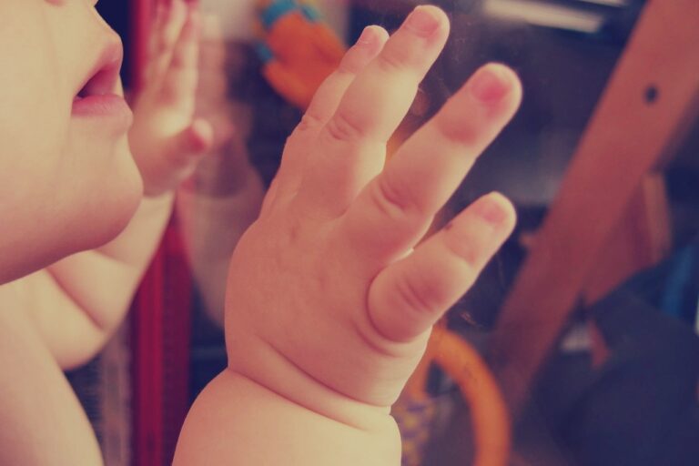 Why Do Babies Grab Your Face With Their Hands?