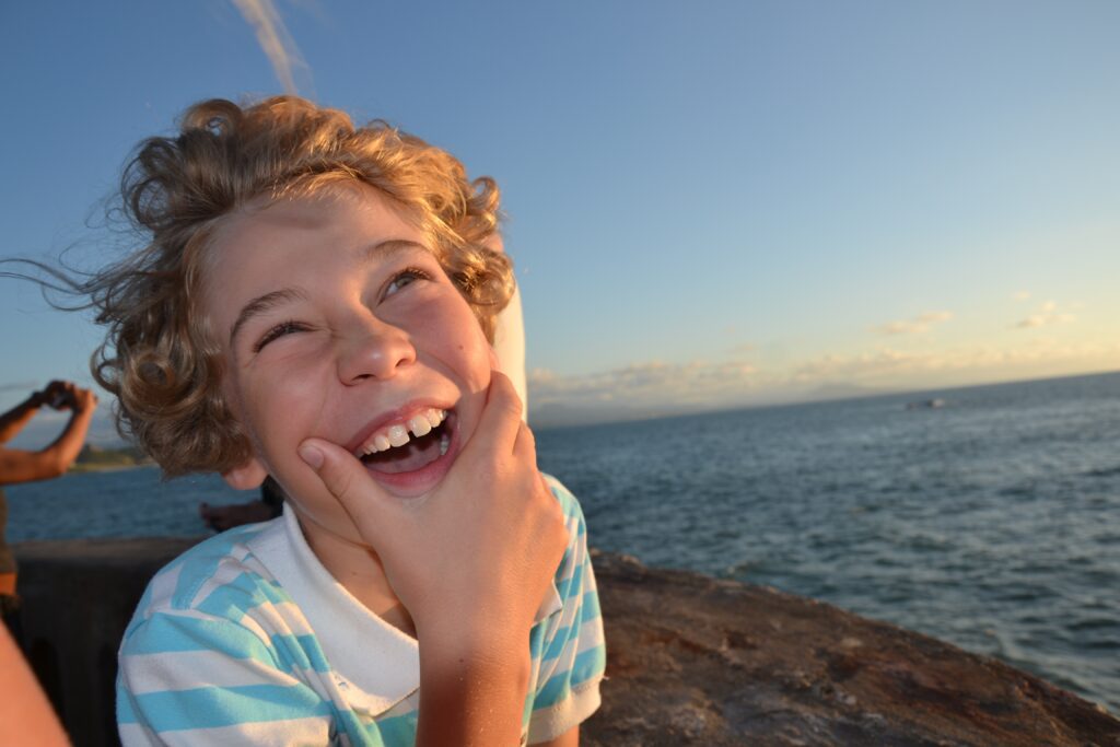 boy laughing dad and son bonding (dad blog)
